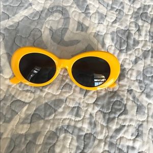 yellow/orange “clout goggles”
